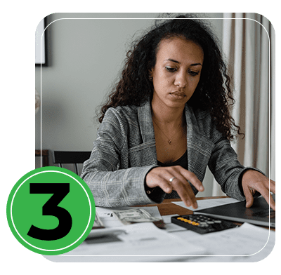woman with money, papers and calculator at home